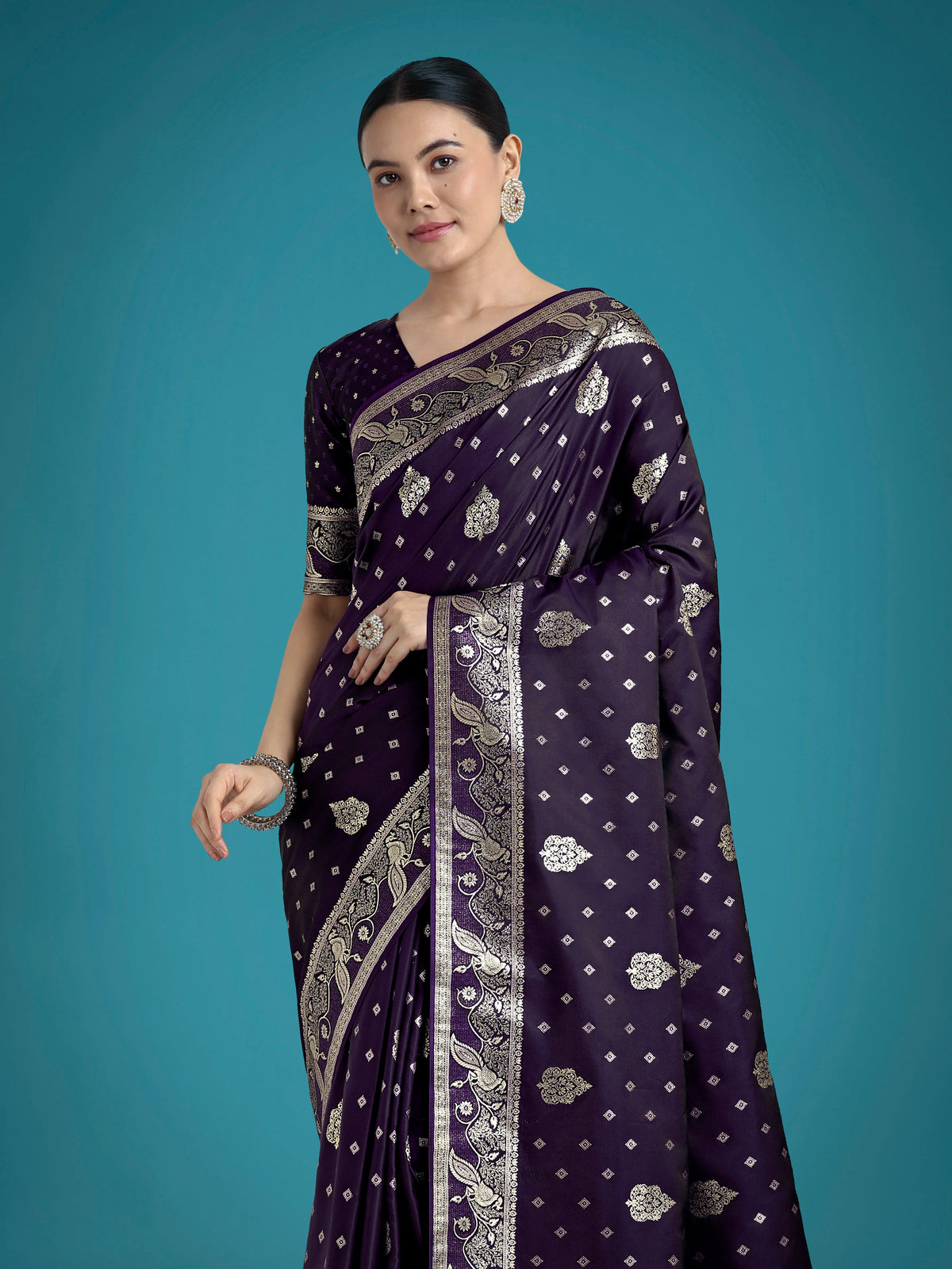Purple Banarasi-Style Satin Saree with Peacock Motif Pallu, styled on model