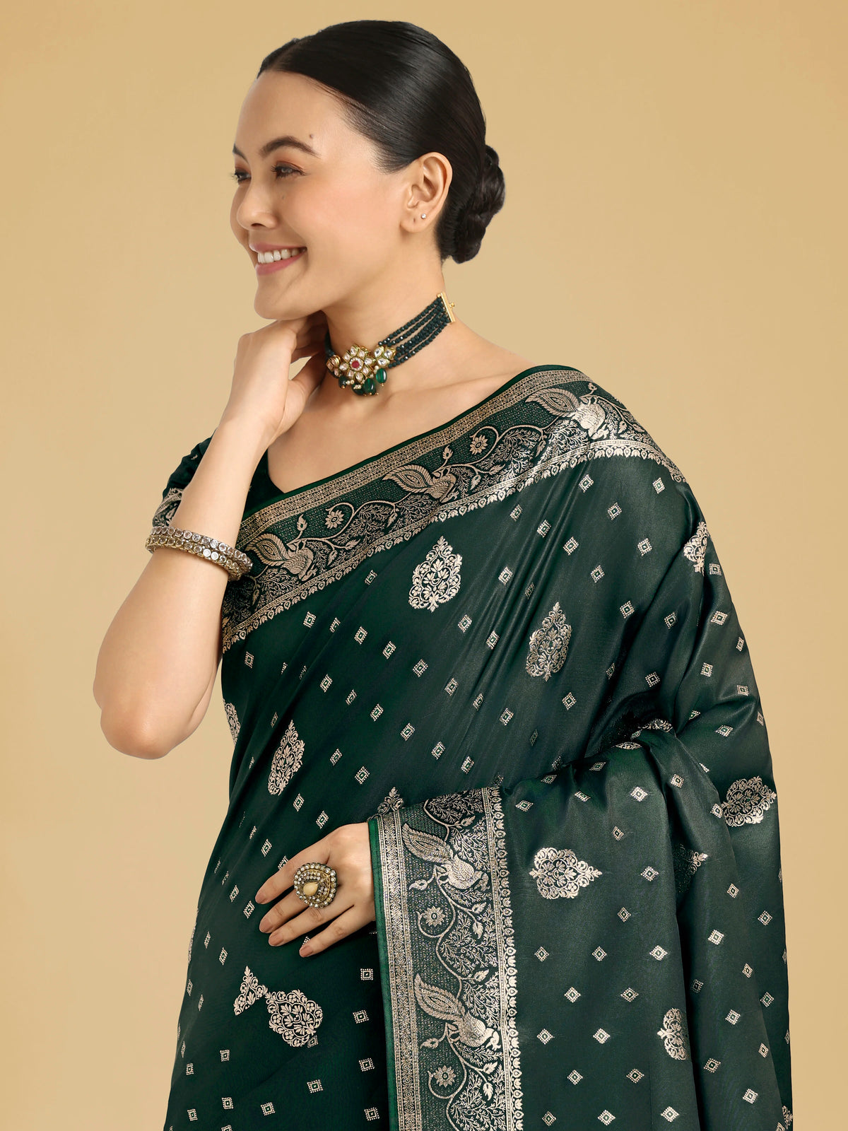 Dark Green Banarasi-Style Satin Saree with Peacock Motif Pallu, drape detail