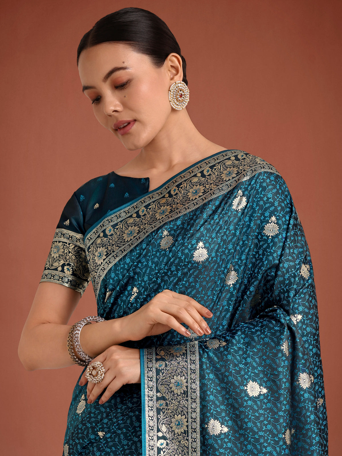 Teal Banarasi-Style Satin Saree with Arched Paisley Pallu, drape detail