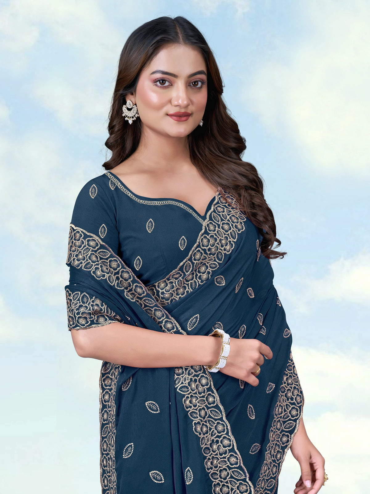 Teal Blue Georgette Saree with Embroidered Leaf Buti, border close-up