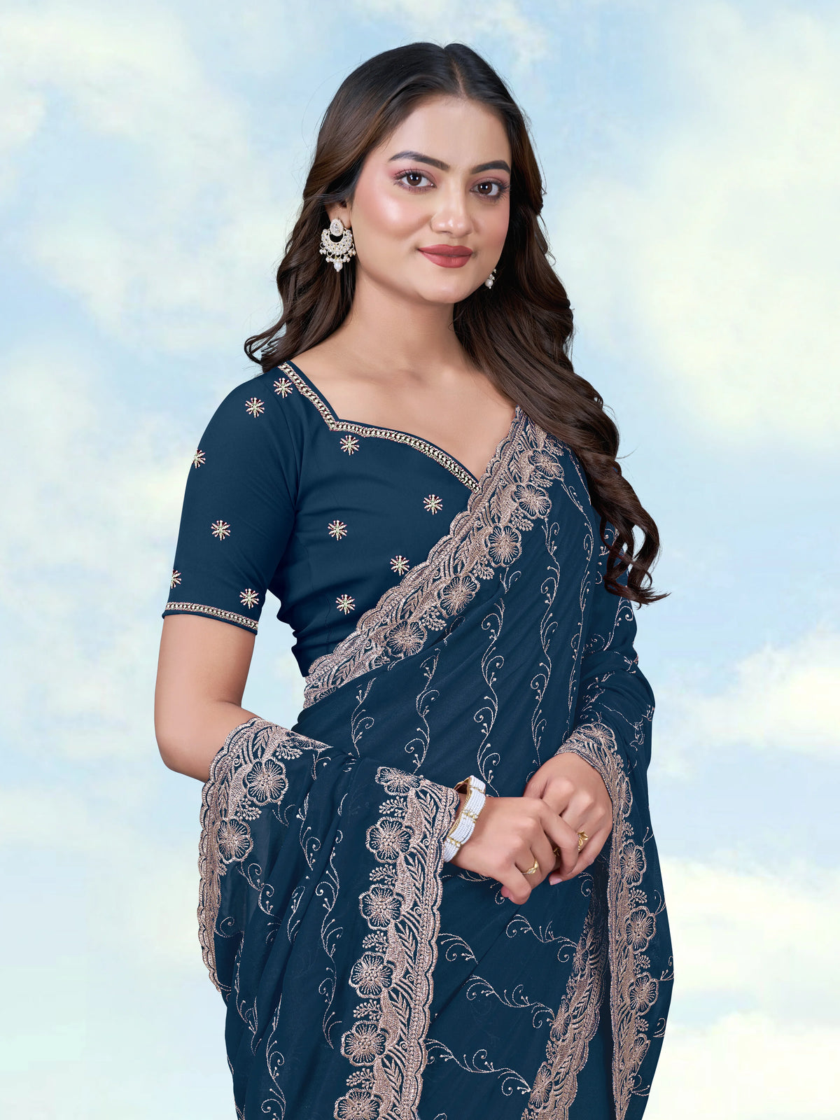 Teal Blue Georgette Saree with Embroidered Vine Stripes, border close-up