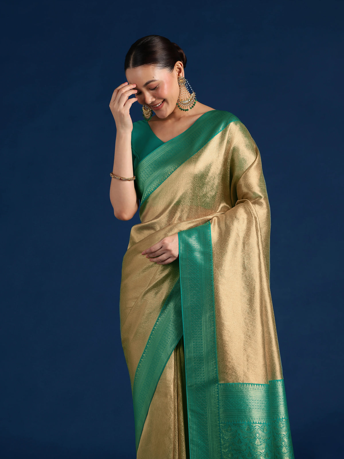 Turquoise Silk Blend Saree with Wide Zari Border, drape detail