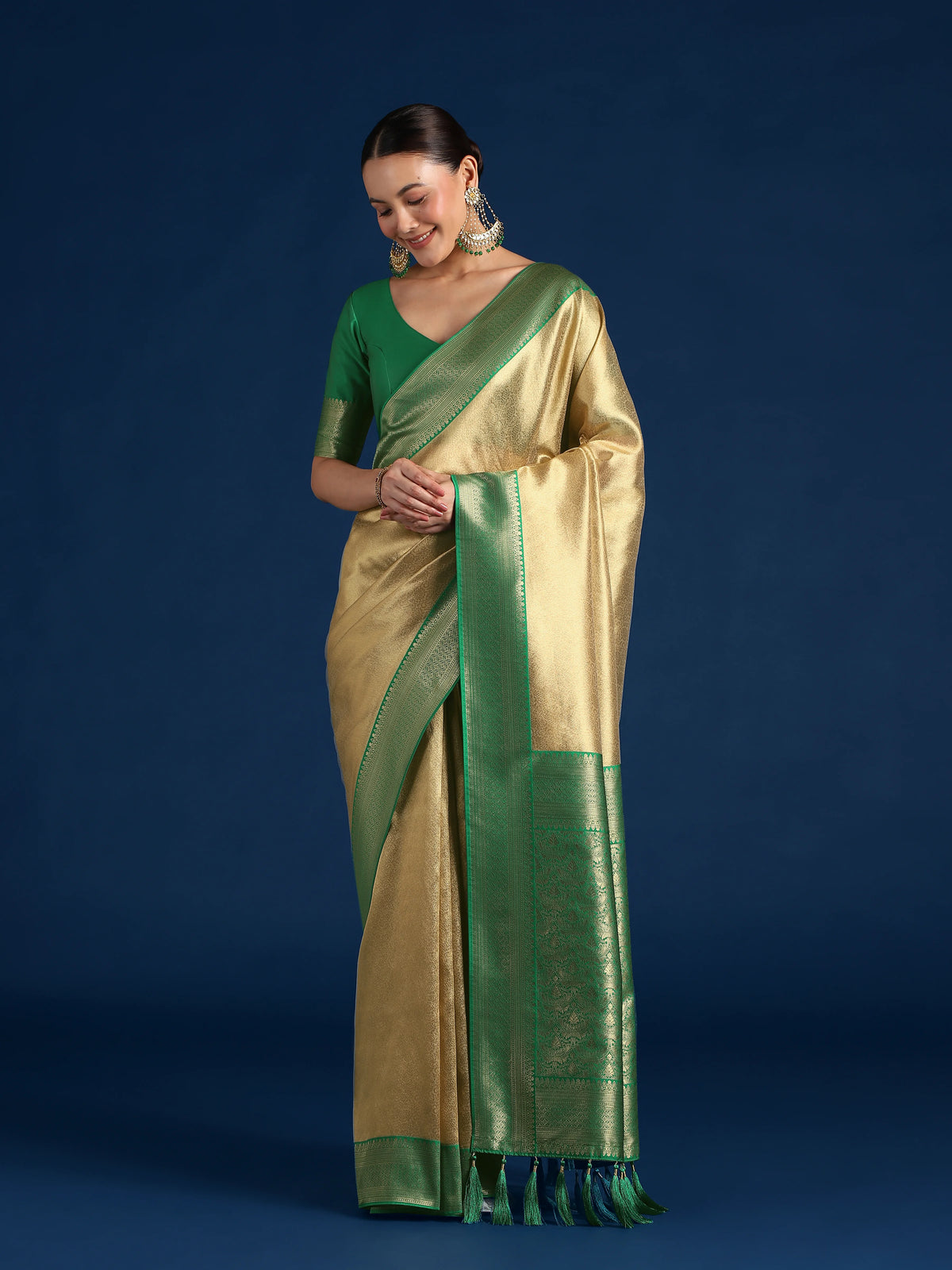 Dark Green Silk Blend Saree with Wide Zari Border, styled on model