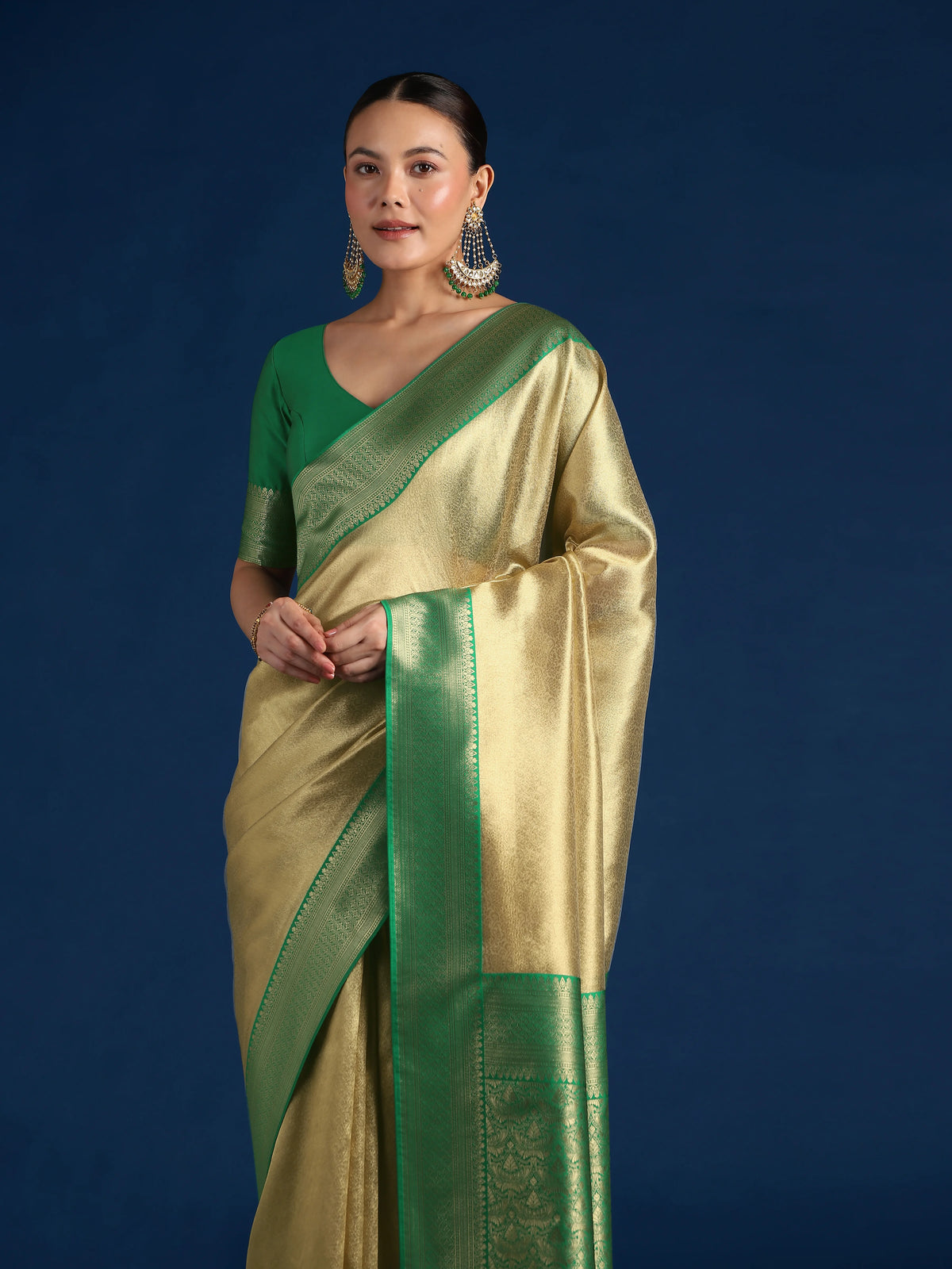 Dark Green Silk Blend Saree with Wide Zari Border, drape detail