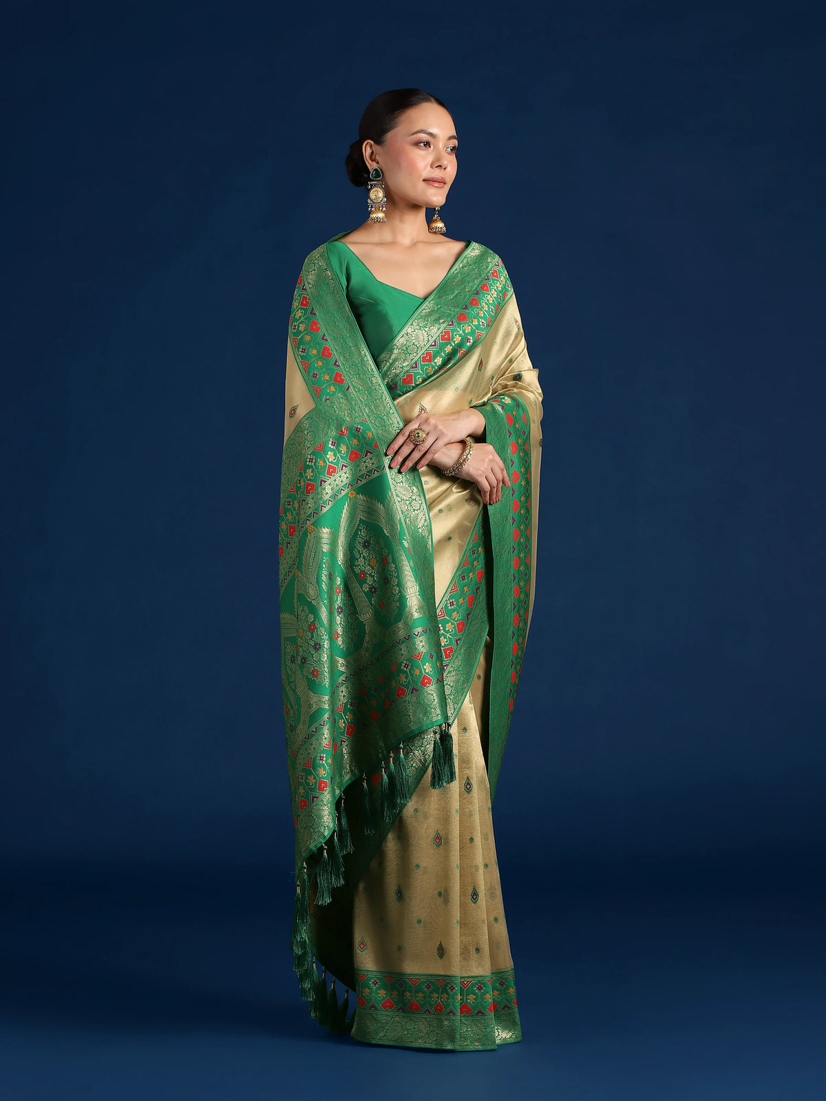 Dark Green Silk Blend Saree with Zari Weave Pallu, styled on model