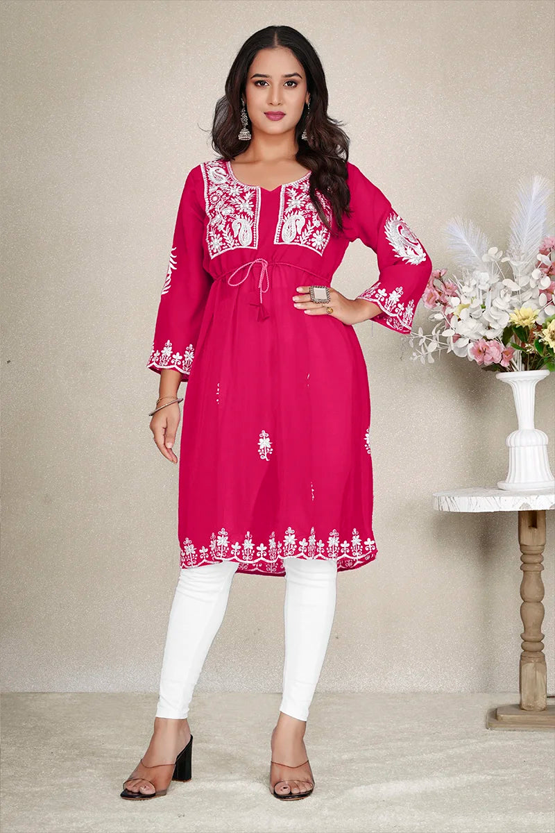 Rani Pink Georgette Embroidered A-Line Kurti, styled on model