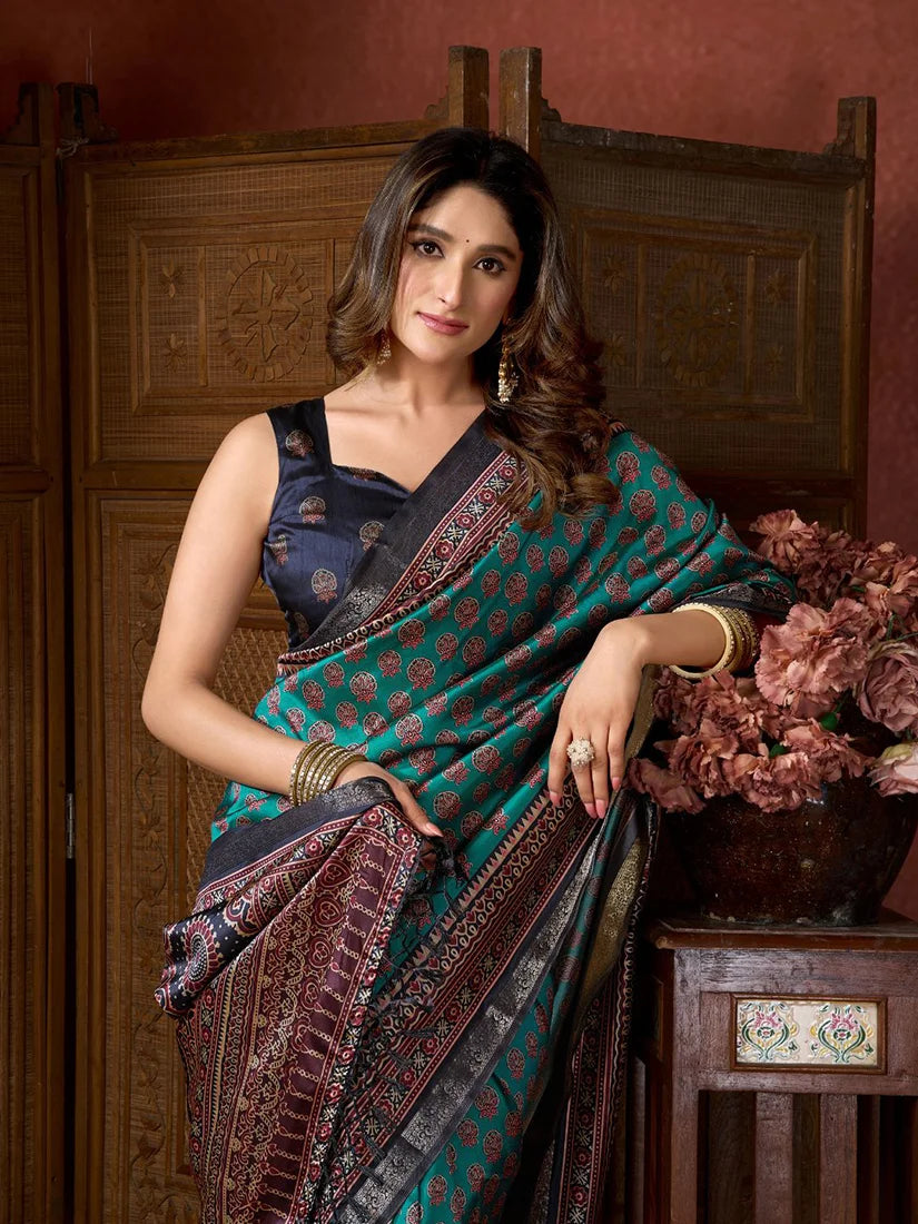 Teal Crepe Saree with Printed Medallion Pallu, blouse and pallu close-up