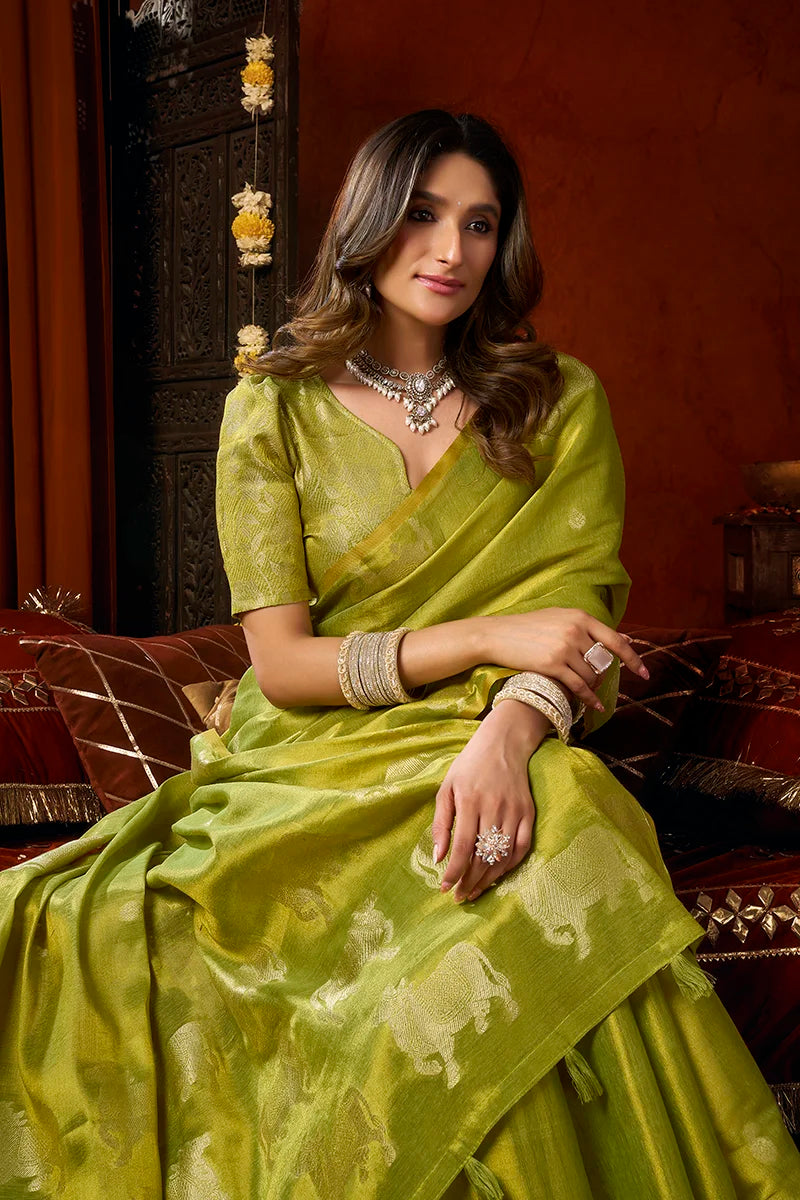 Lime Tissue Saree with Cow Motif Pallu, blouse and pallu close-up