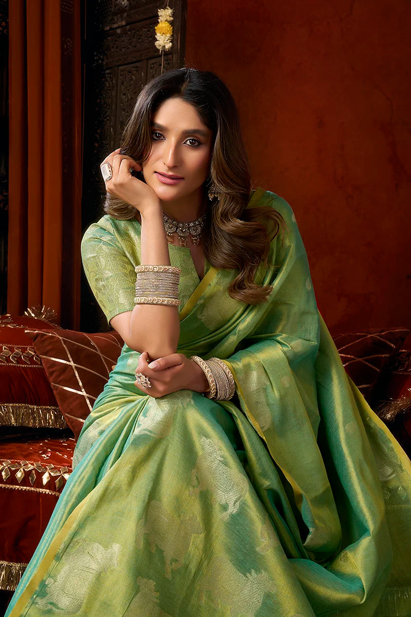 Sea Green Tissue Saree with Cow Motif Pallu, blouse and pallu close-up