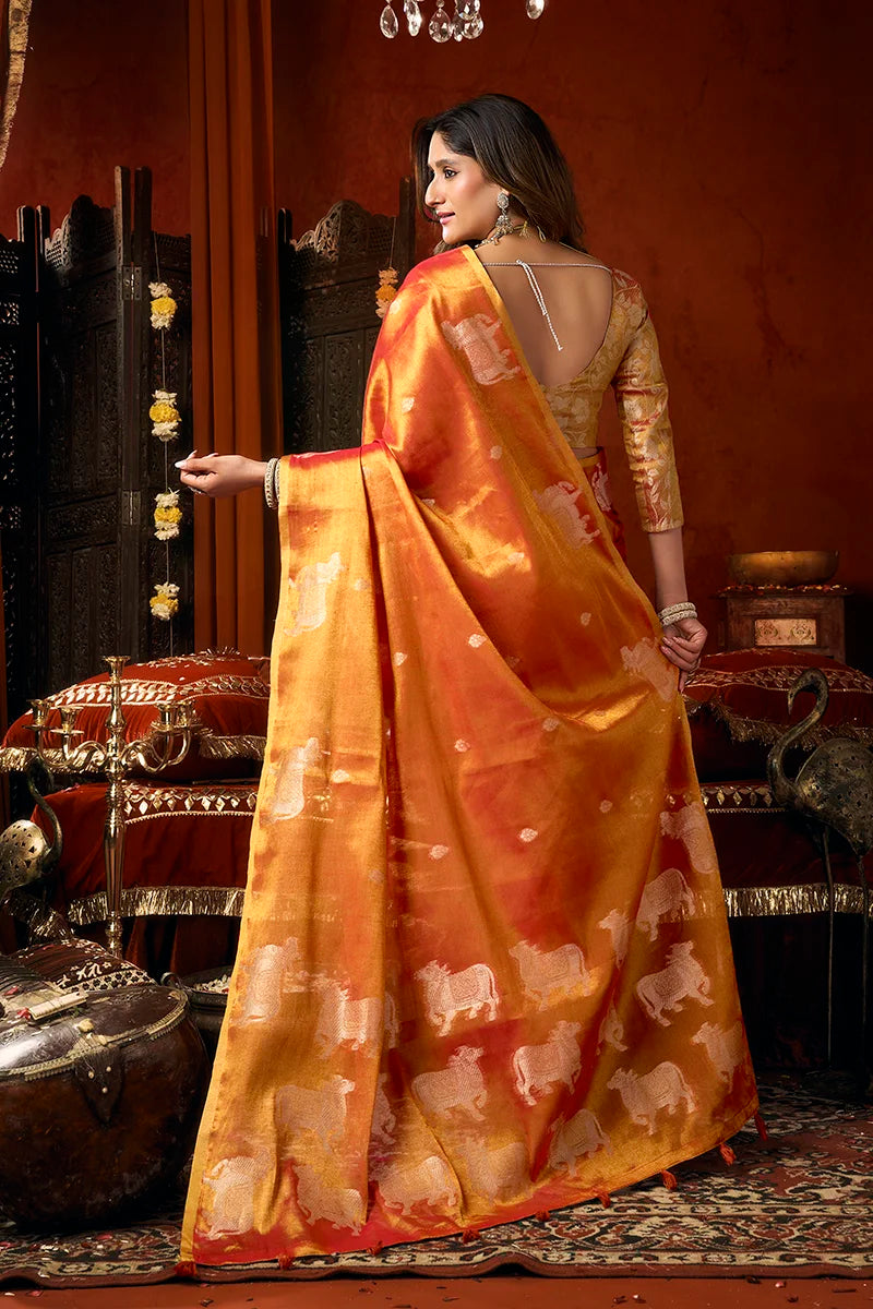 Orange Tissue Saree with Cow Motif Pallu, back