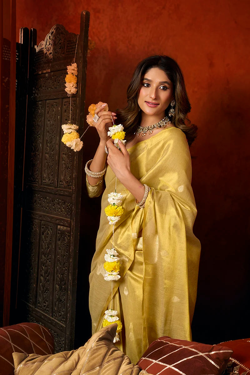 Yellow Tissue Saree with Cow Motif Pallu, blouse and pallu close-up