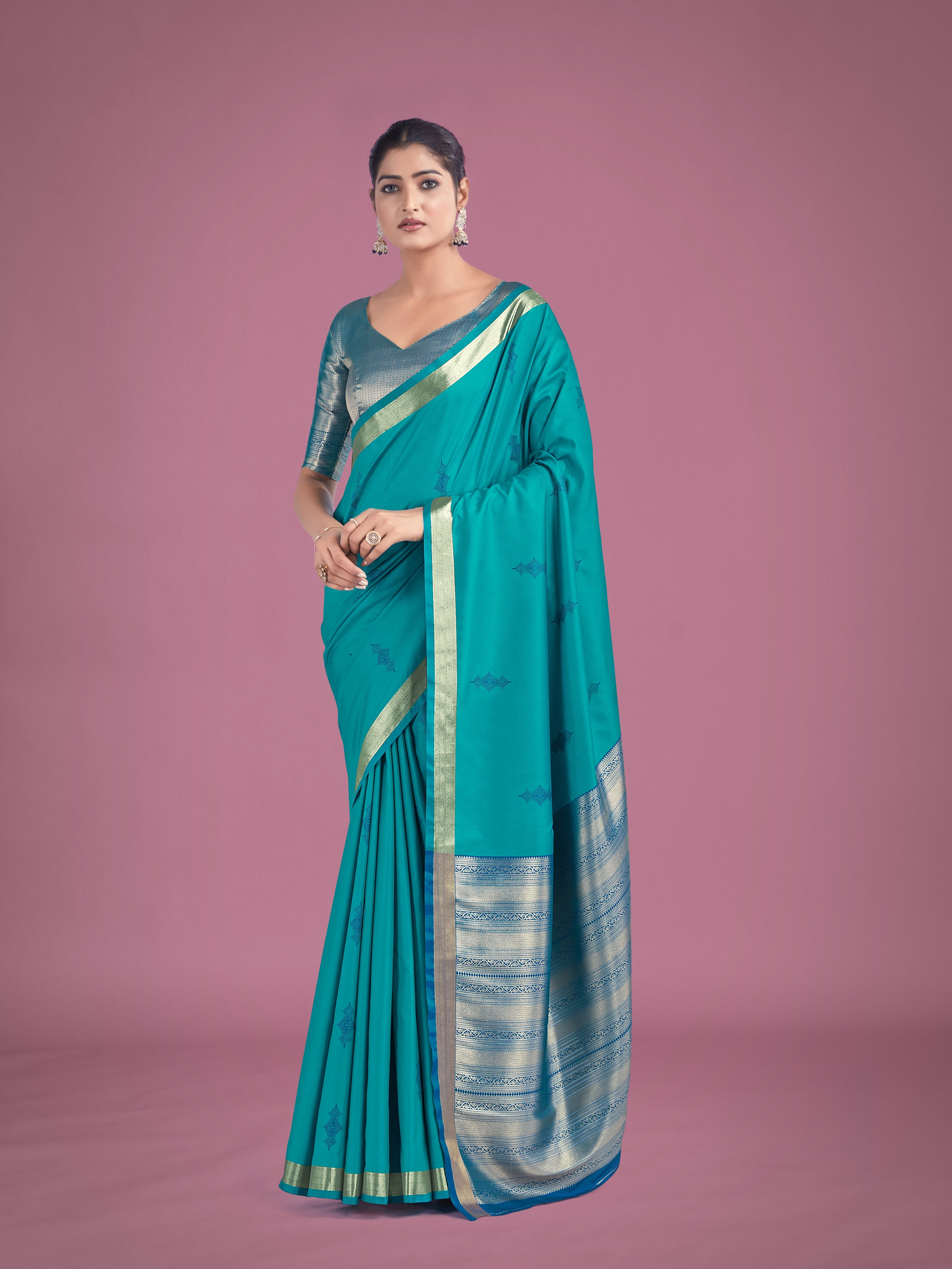 Charming Turquoise Color Silk Golden Zari Woven Ceremony Saree