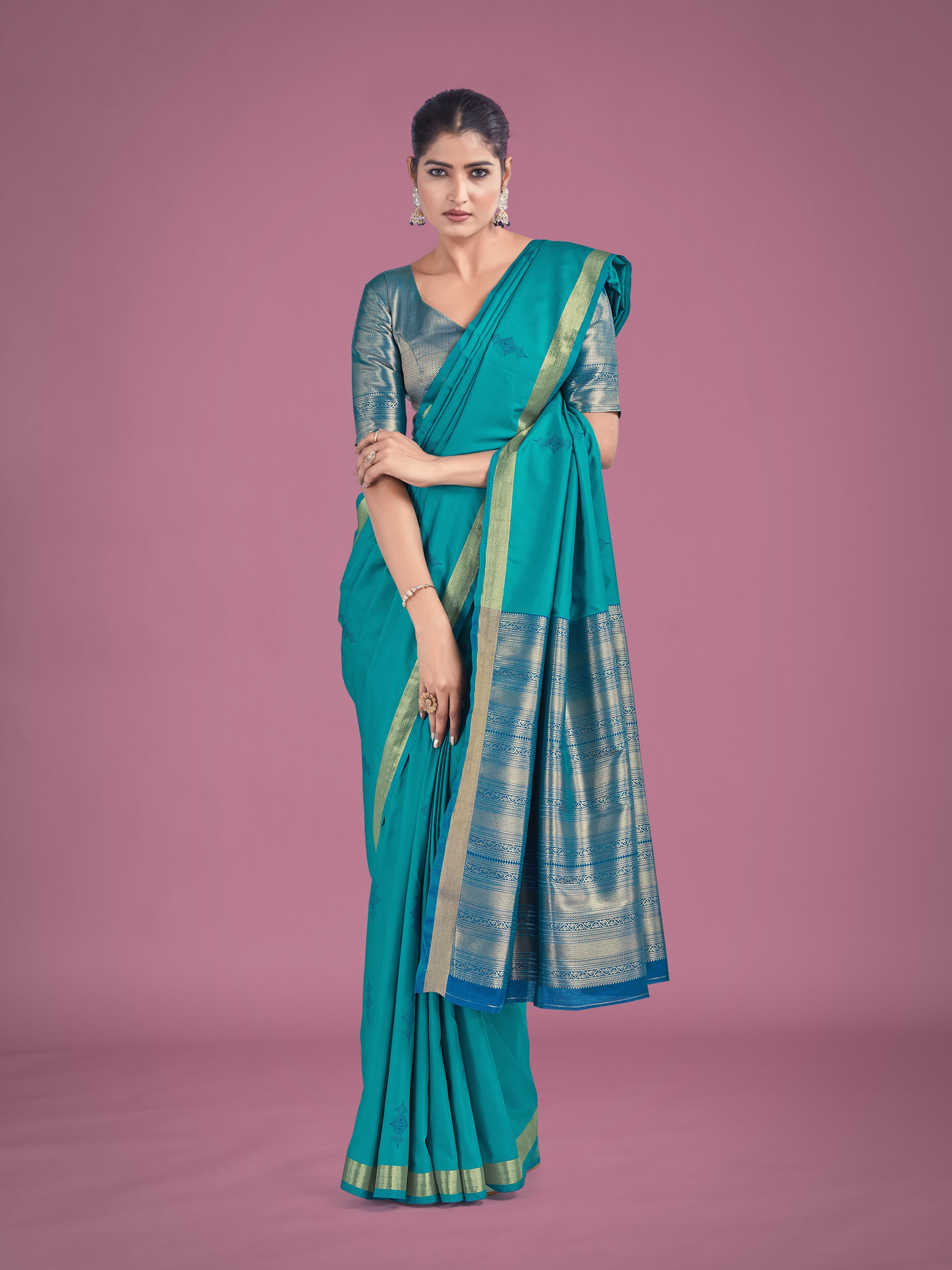 Charming Turquoise Color Silk Golden Zari Woven Ceremony Saree
