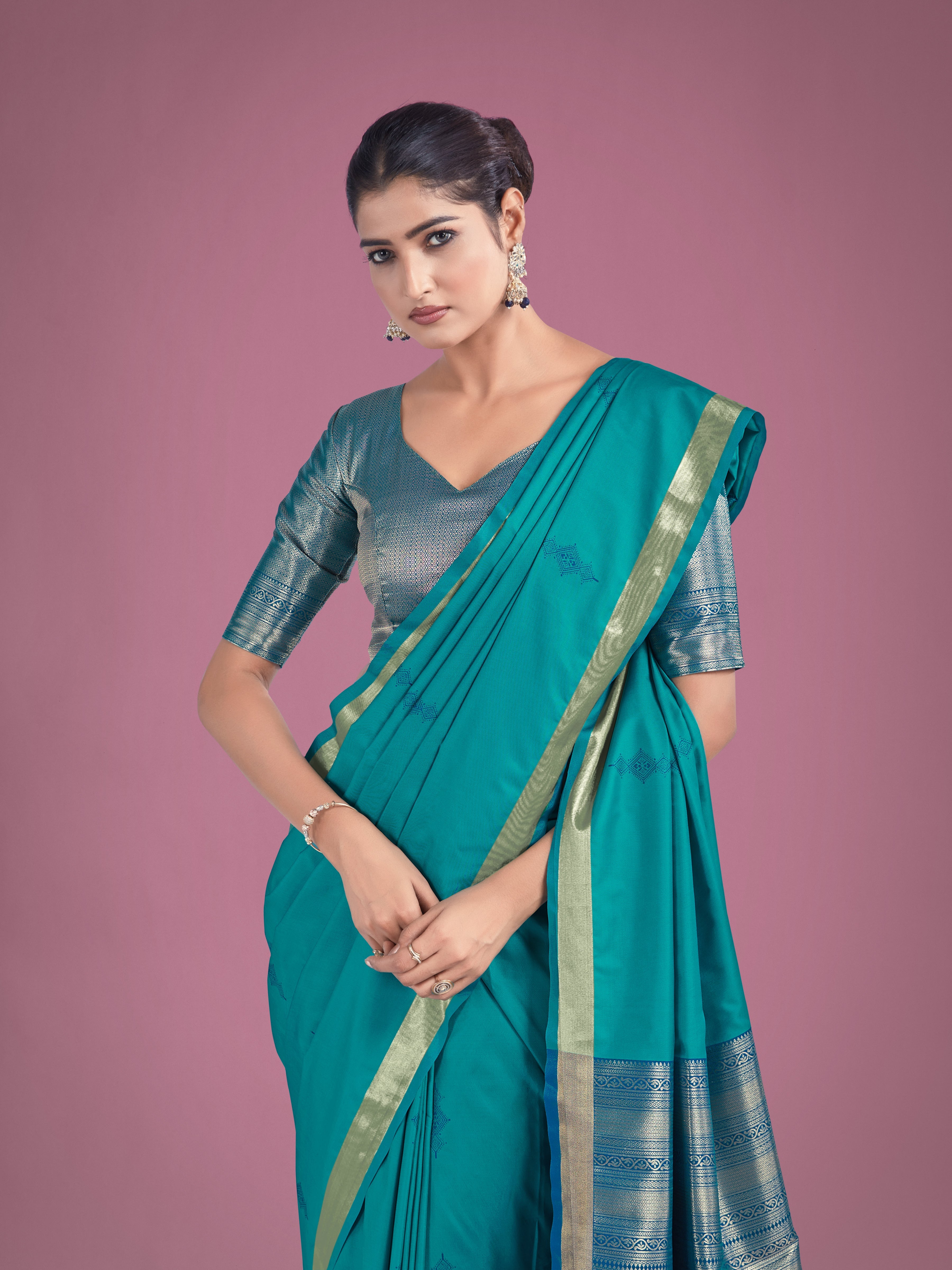 Charming Turquoise Color Silk Golden Zari Woven Ceremony Saree
