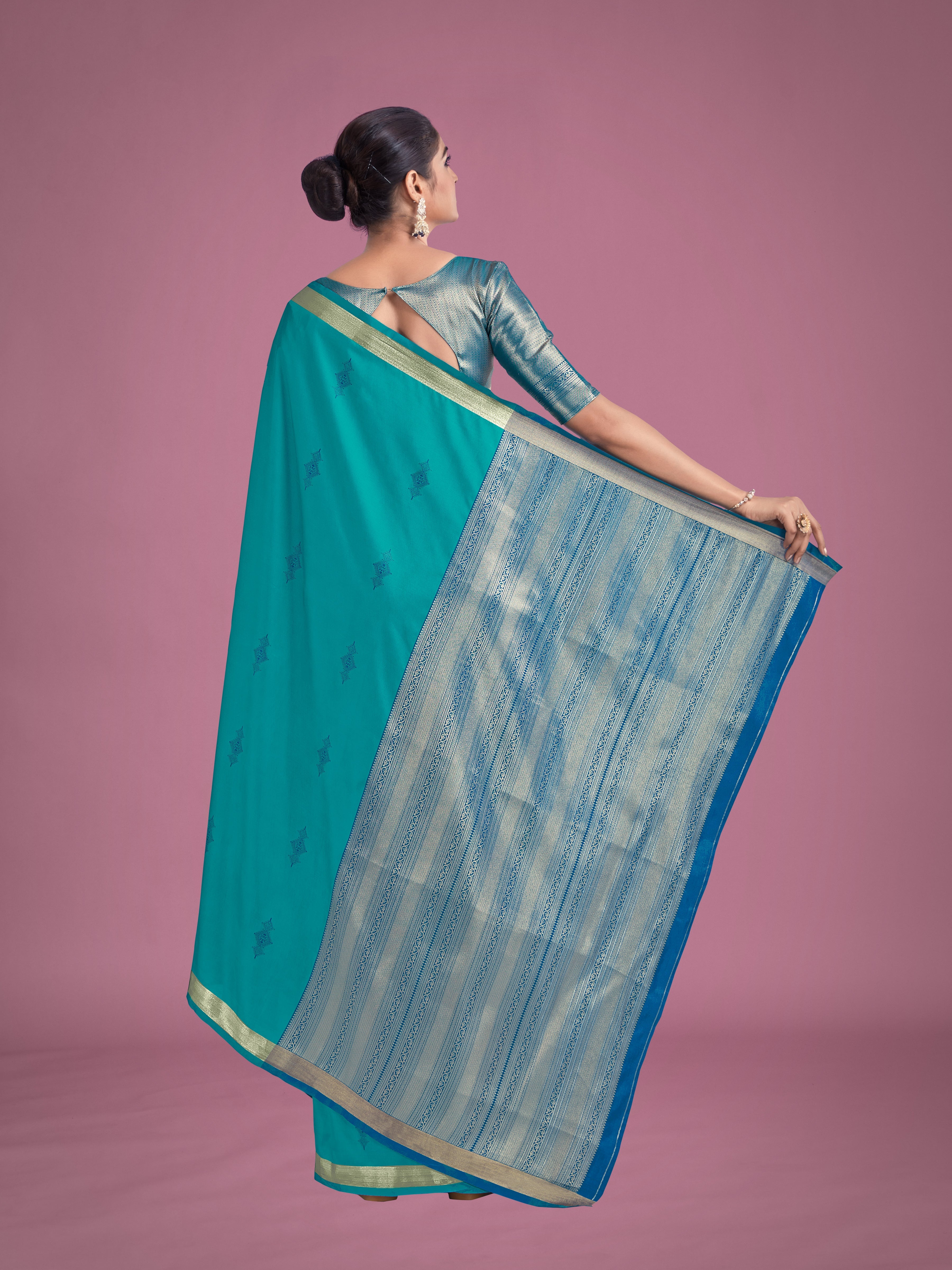 Charming Turquoise Color Silk Golden Zari Woven Ceremony Saree