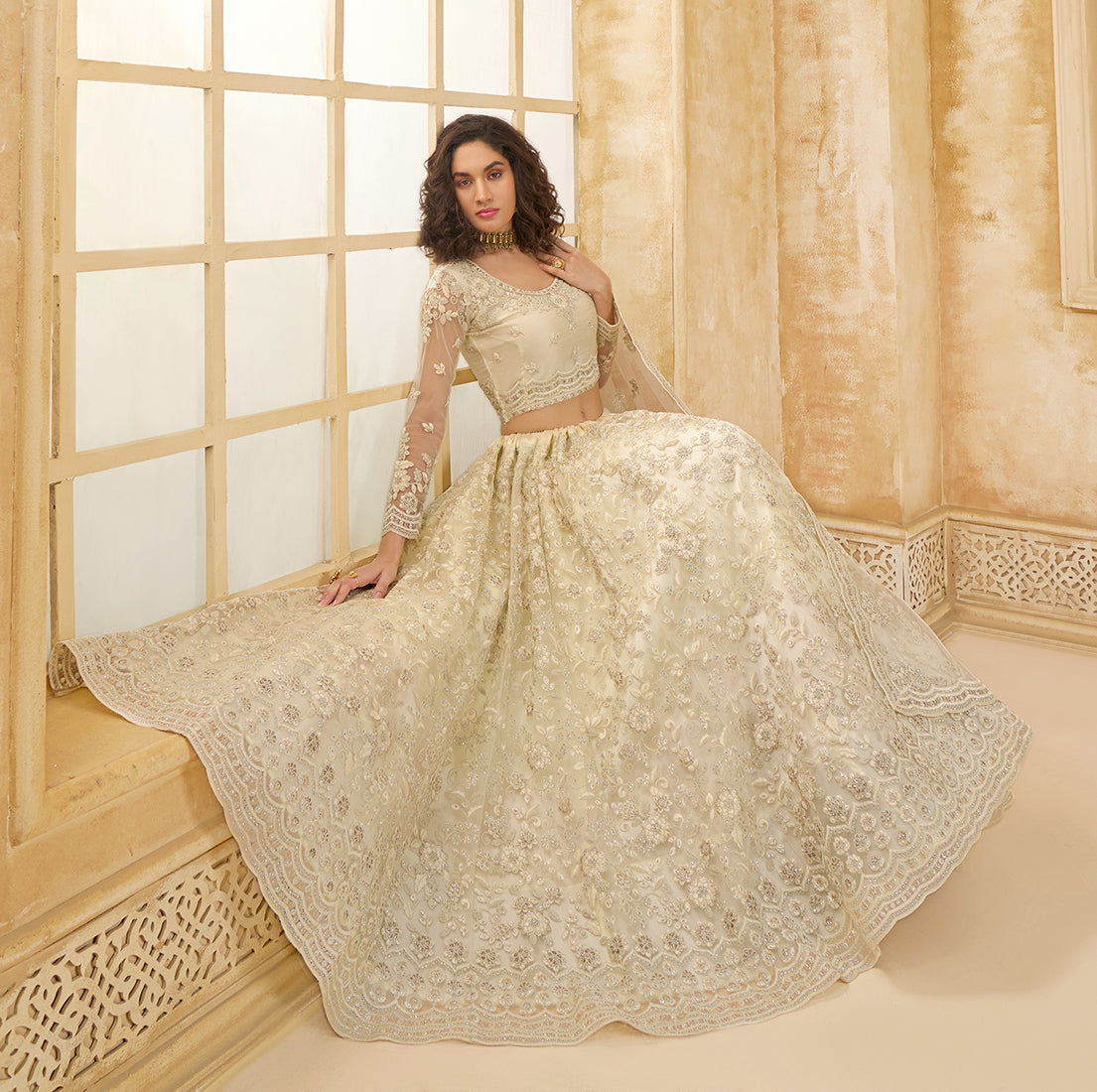 Cream Net Thread Embroidery Stone Work Lehenga Choli
