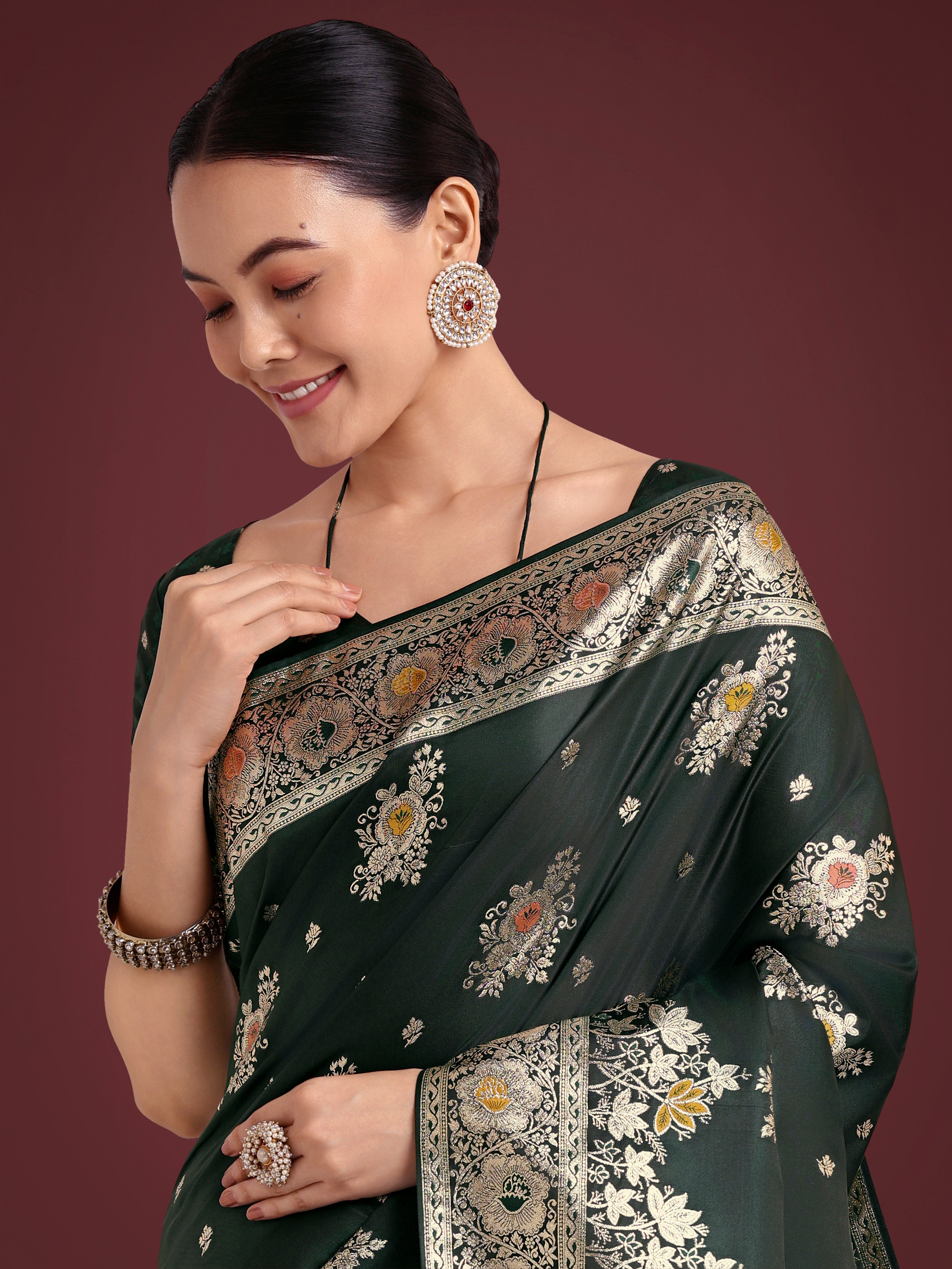 Dark Green Glamour and Tradition With This Zari Woven Banarasi Satin Silk Saree