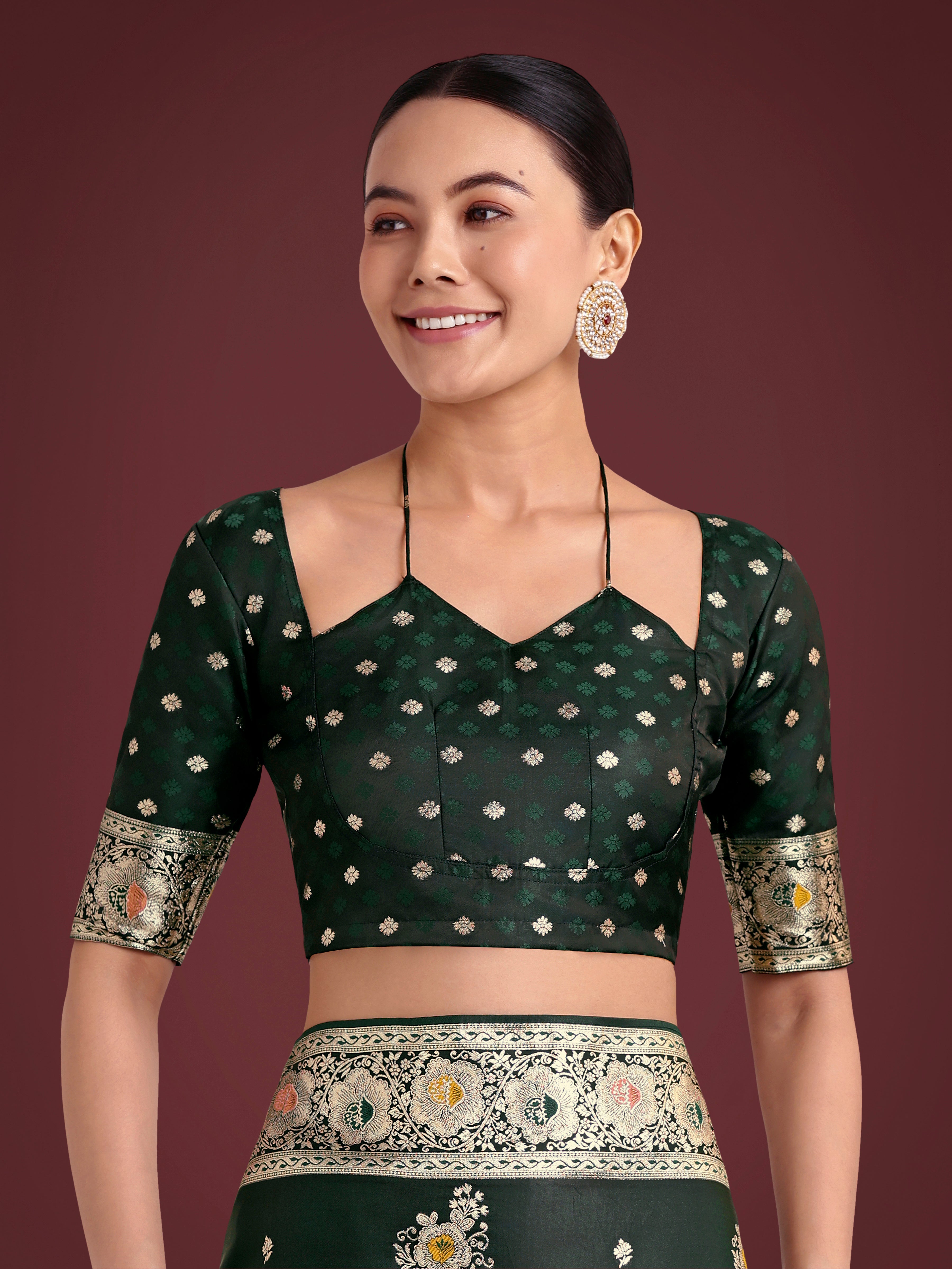 Dark Green Glamour and Tradition With This Zari Woven Banarasi Satin Silk Saree