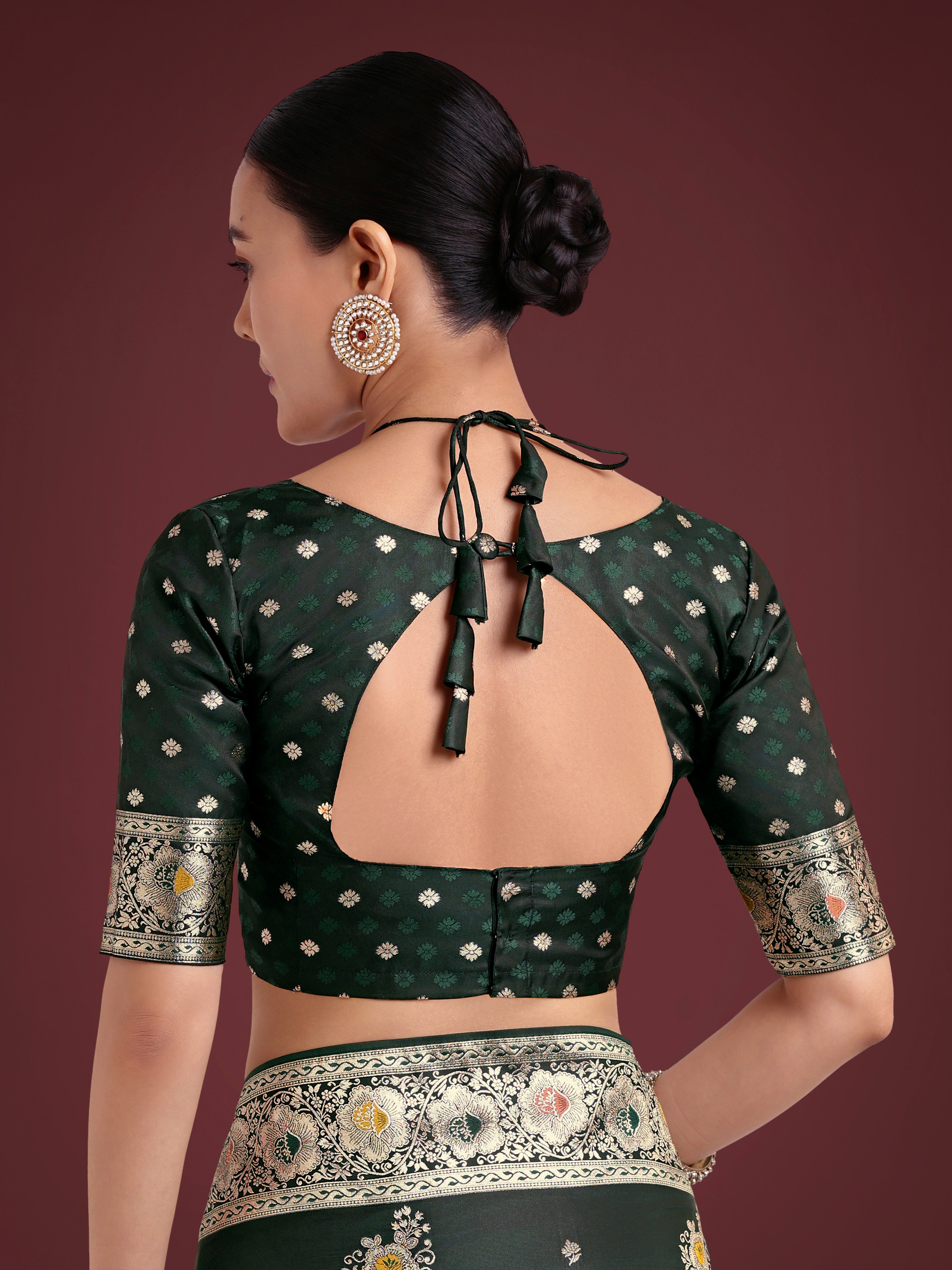 Dark Green Glamour and Tradition With This Zari Woven Banarasi Satin Silk Saree