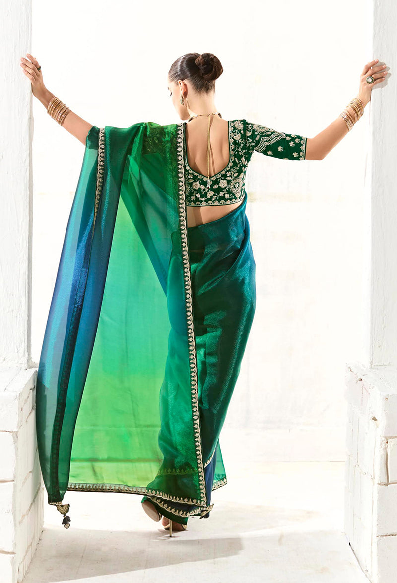 Green Tissue Silk Saree Featuring Intricate Sequins Work