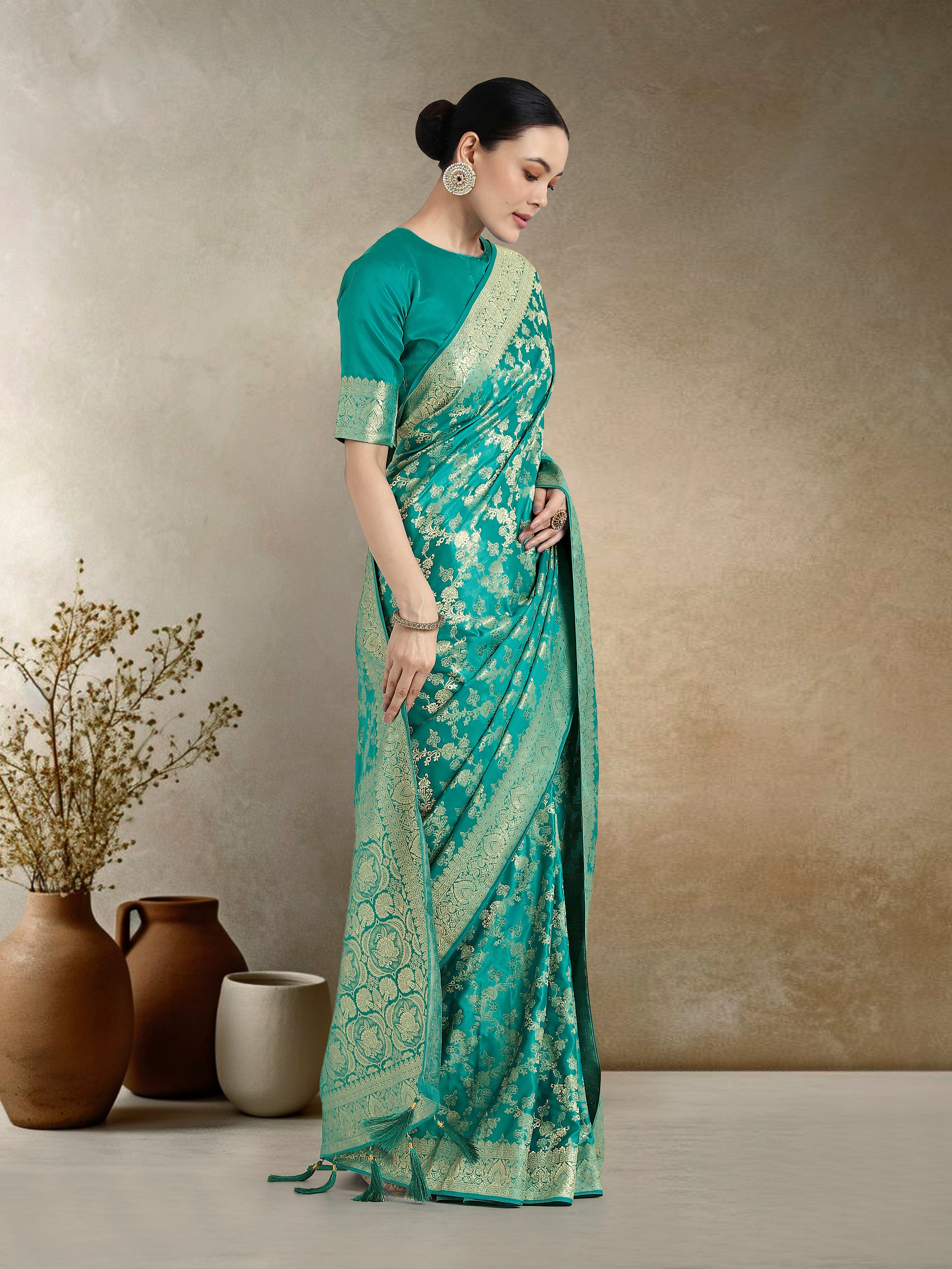 Effervescent Turquoise Soft Banarasi Satin Silk Saree With Elision Blouse Piece