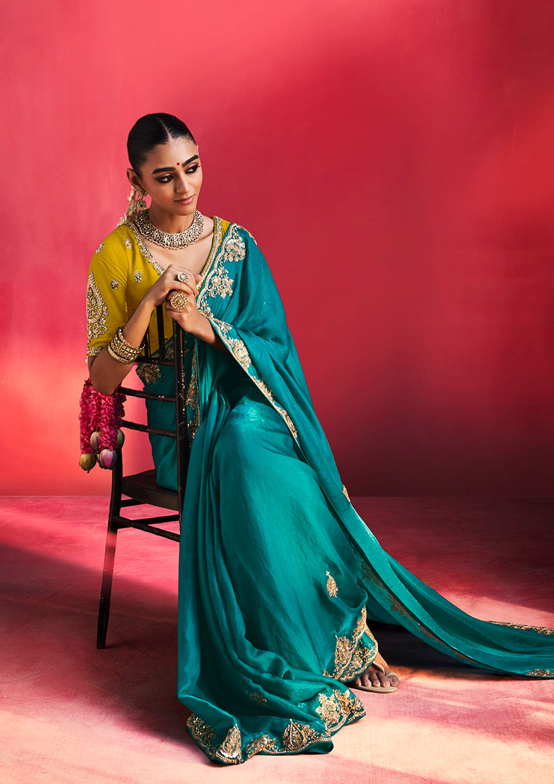 Teal Blue Silk Blend Saree with Yellow Blouse, seated view