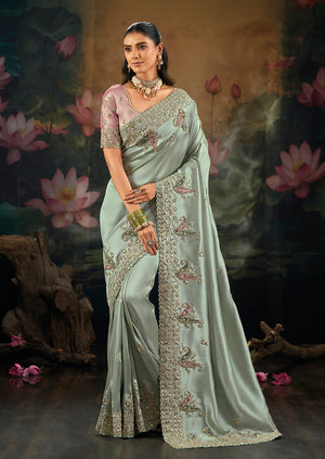 Aqua Blue Silk Blend Saree with Floral Embroidered Border