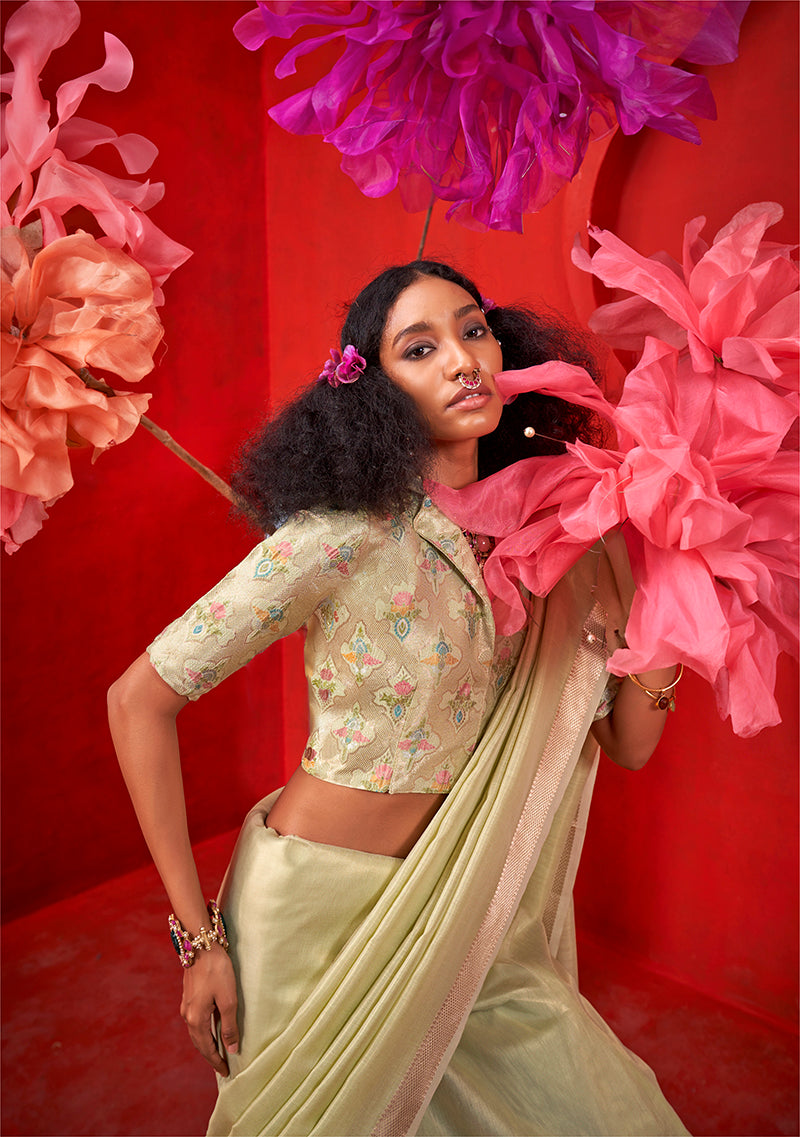 Pista Green Shimmering Tissue Silk Saree With Golden Zari Highlights