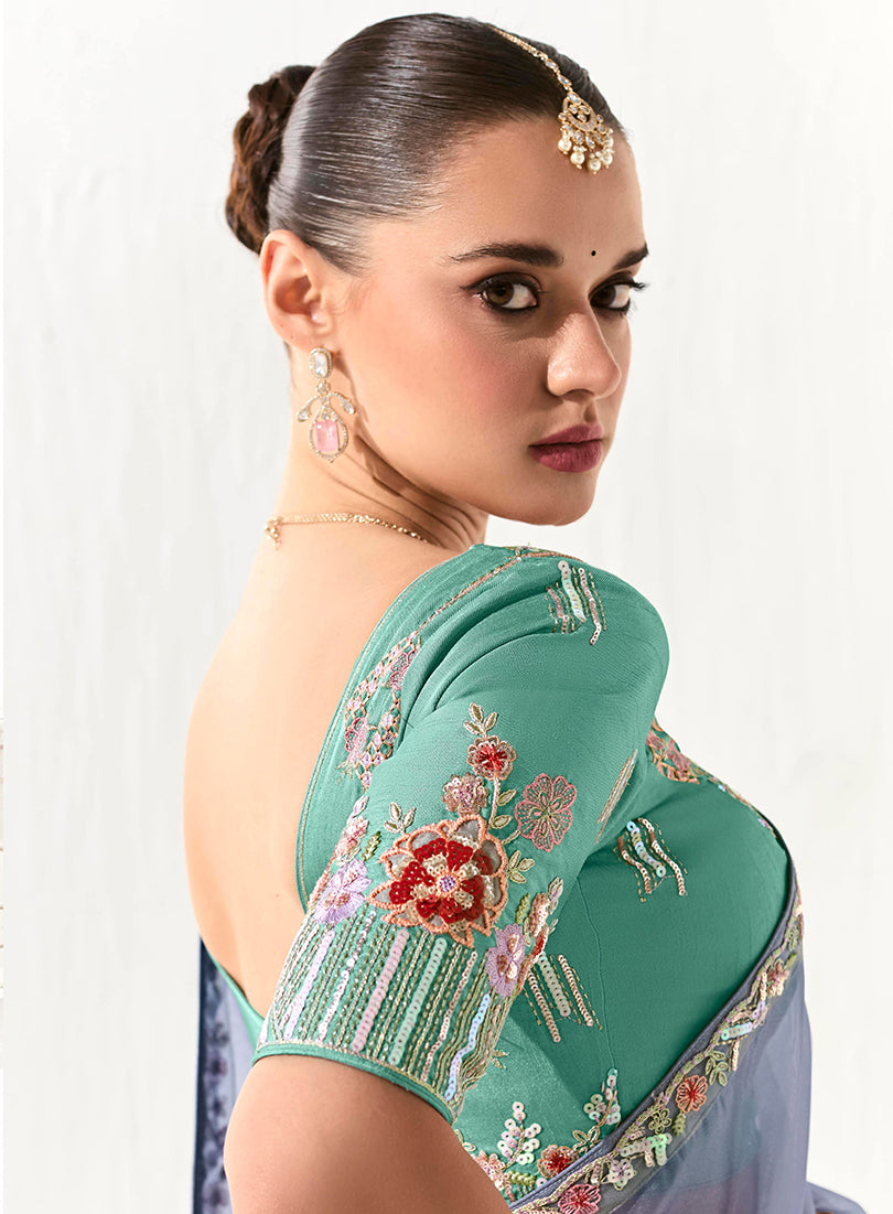 Light Lavender Tissue Silk Saree Featuring Intricate Sequins Work