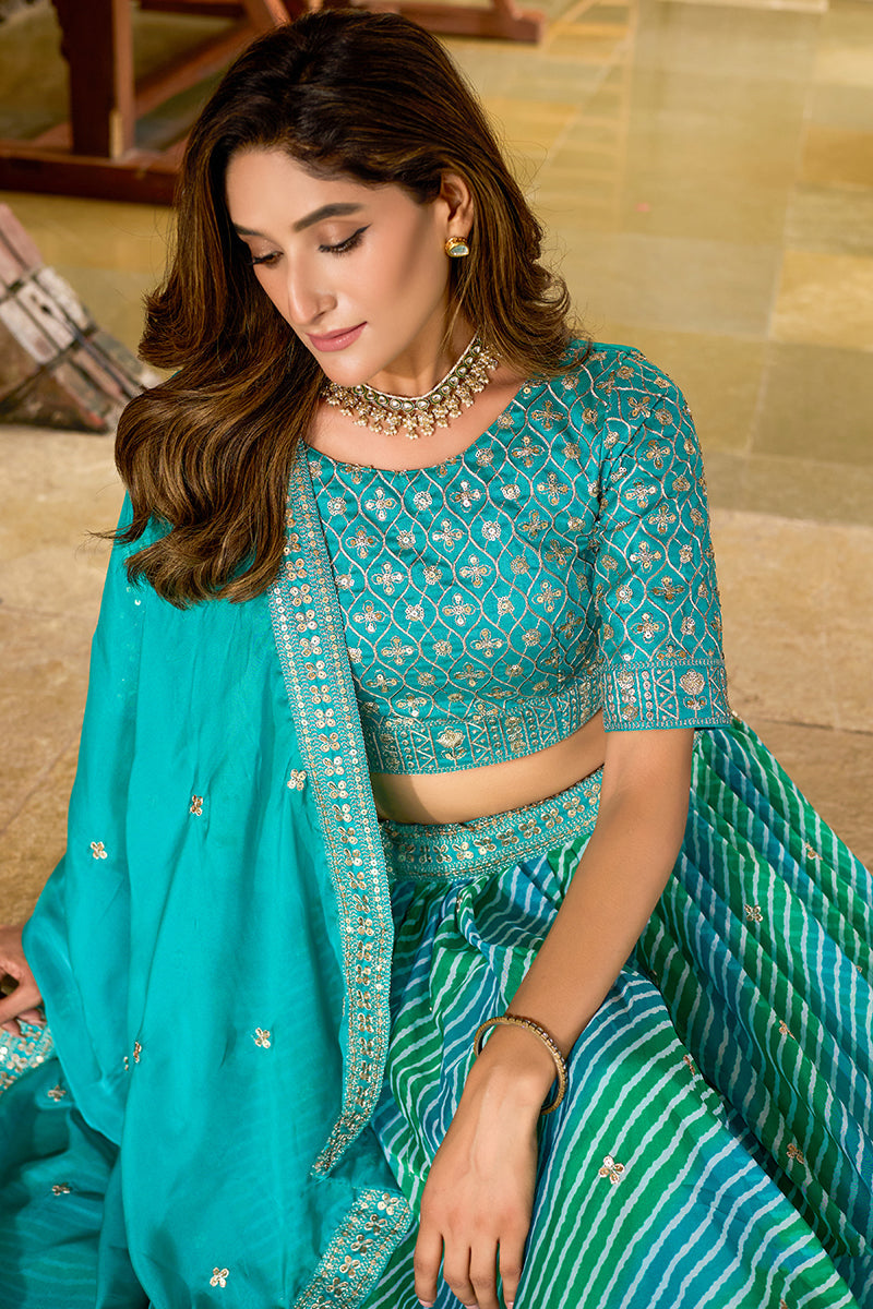 Turquoise Leheriya Print Embroidered Faux Georgette Lehenga Choli